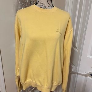 Super cute Honey yellow sweatshirt from Brandy Melville/ OS